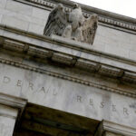 Feds says will slow balance sheet runoff process
